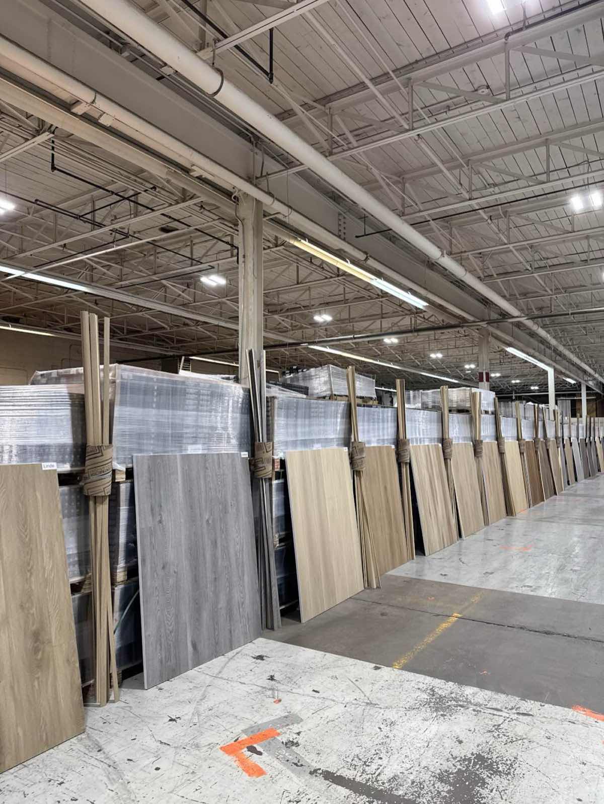 Flooring sample displays inside Calgary Liquidator warehouse